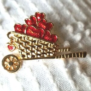 Vintage AVON gold-tone Garden of Love pin brooch. Wheelbarrow of red hearts.